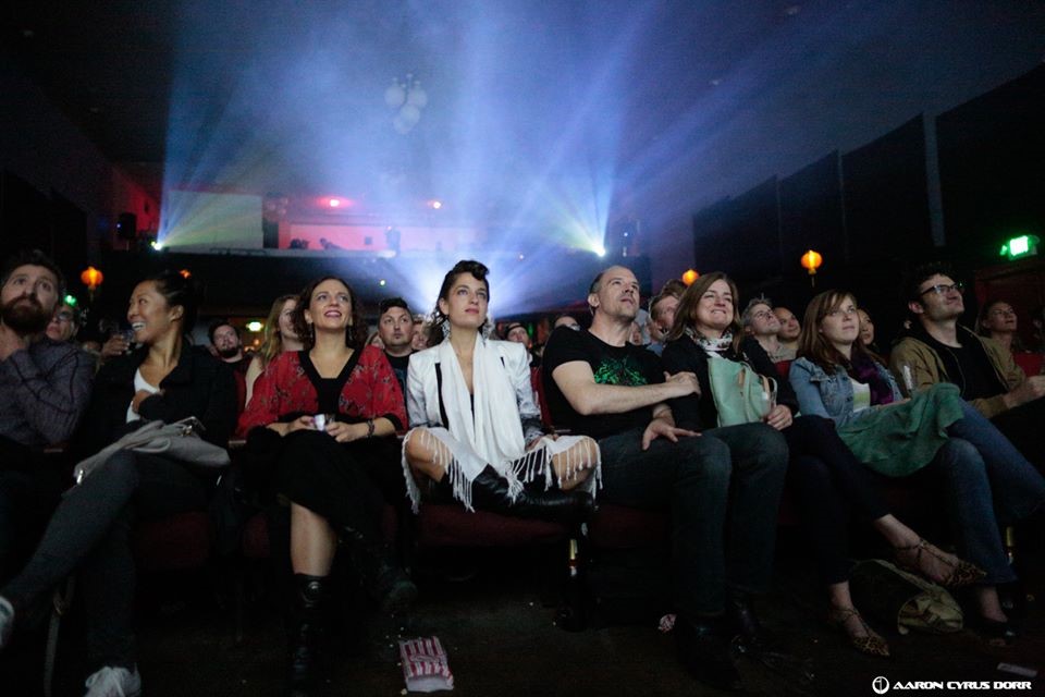 People watching a movie at the Great Star Theater in 2016